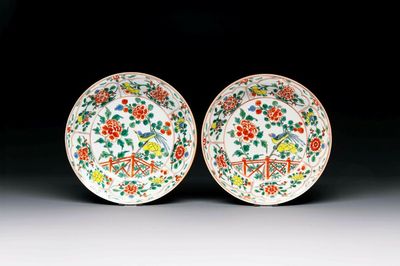 A pair of Chinese famille verte 'bird and peonies' plates, Kangxi