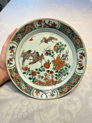 A pair of Chinese famille verte 'Birds Among Flowering Branches' plates, Kangxi — photo 1