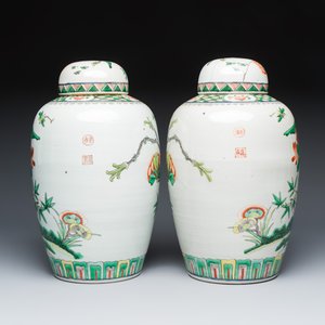 A pair of Chinese famille verte 'Birds among Flowering Branches' vases and covers — photo 4