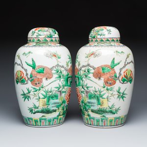 A pair of Chinese famille verte 'Birds among Flowering Branches' vases and covers — photo 5