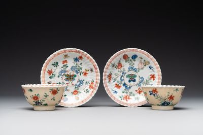 A pair of Chinese famille verte cafe-au-lait-ground cups and saucers, Kangxi