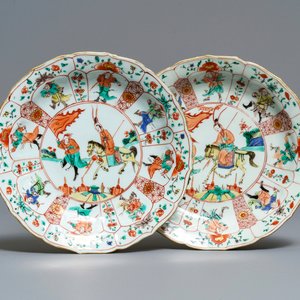 A pair of Chinese famille verte lotus-moulded 'Mu Guiying' plates, Kangxi — photo 1