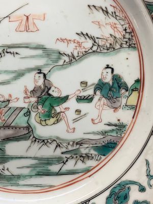 A pair of Chinese famille verte plates with figures along the riverside, artemisia leaf and ding mark, Kangxi — photo 9