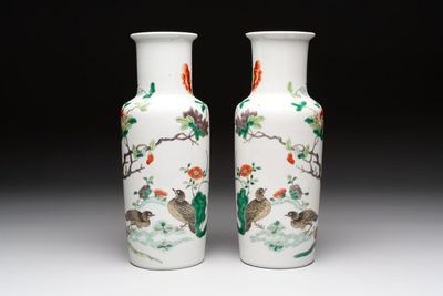 A pair of Chinese famille verte 'quails in blossoming landscape' rouleau vases, 19th C.