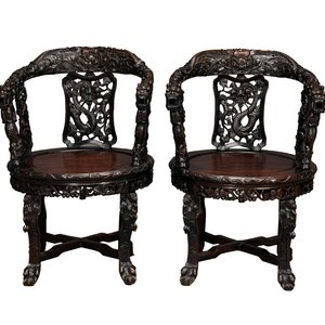 A pair of Chinese finely carved hongmu swivel chairs, Canton, 19th C. — photo 1