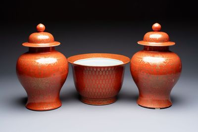 A pair of Chinese gilt-decorated coral-ground covered vases and a 'Double Happiness 囍' jardinière, 19th C.