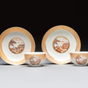 A pair of Chinese gilt-decorated sepia 'Riverscape' cups and saucers, Jiaqing — photo 1