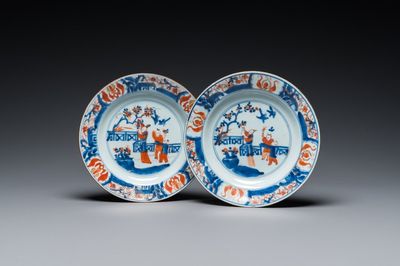 A pair of Chinese Imari-style 'lady with two boys' plates, Kangxi