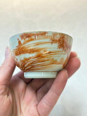 A pair of Chinese iron-red-decorated 'deer hunting' cups and saucers, Qianlong — photo 12
