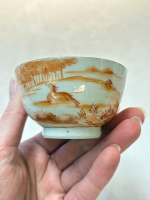 A pair of Chinese iron-red-decorated 'deer hunting' cups and saucers, Qianlong — photo 14