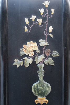 A pair of Chinese lacquer and semi-precious stones panels, early 20th C.