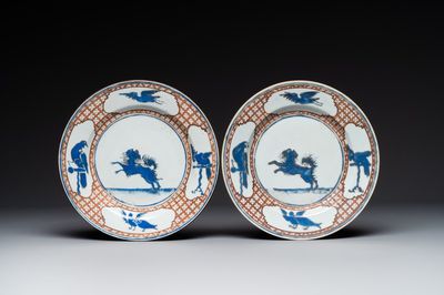 A pair of Chinese 'leaping pekinese' plates, possibly after a design by Cornelis Pronk, Qianlong, ca. 1740