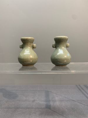 A pair of Chinese Longquan celadon miniature 'touhu' vases, Song/Yuan — photo 1