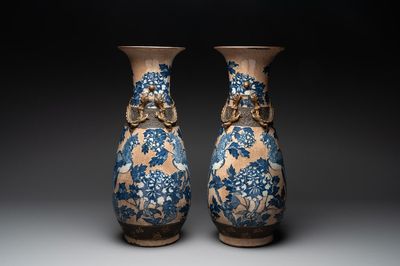 A pair of Chinese Nanking blue and white crackle-glazed 'phoenix' vases, 19th C.