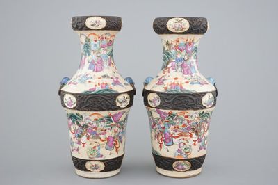 A pair of Chinese Nanking famille rose vases with warrior scenes, 19th C.