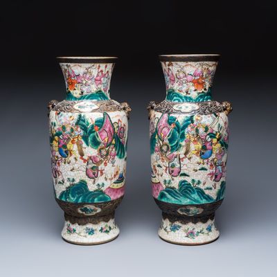 A pair of Chinese Nanking famille rose 'Warriors' vases, 19th C.