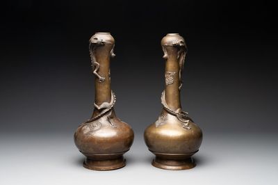 A pair of Chinese or Vietnamese gold-splashed bronze garlic-mouth 'dragon' vases, with seal mark, 17/18th C.