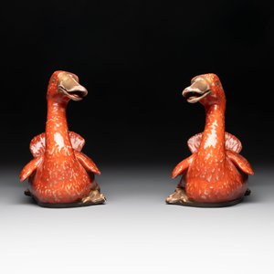 A pair of Chinese partly gilt coral-red-glazed models of ducks on wooden stands, 20th C. — photo 2