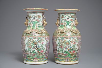 A pair of Chinese pink ground Canton vases, 19th C.