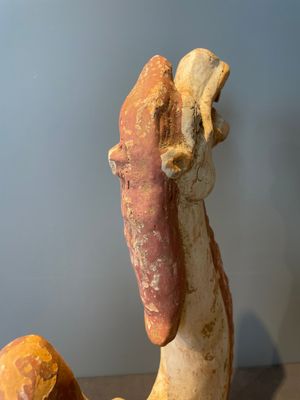 A pair of Chinese polychrome-painted terracotta camels with saddles, Tang — 照片 74