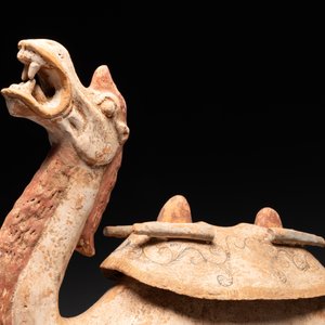 A pair of Chinese polychrome-painted terracotta camels with saddles, Tang — 照片 16