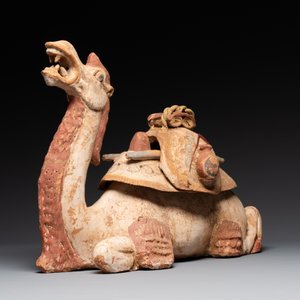 A pair of Chinese polychrome-painted terracotta camels with saddles, Tang — 照片 3