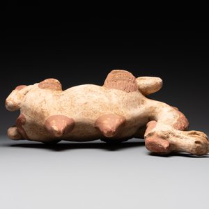 A pair of Chinese polychrome-painted terracotta camels with saddles, Tang — 照片 9