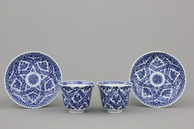 A pair of Chinese porcelain blue and white cups and saucers, Guangxu