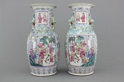 A pair of Chinese porcelain famille rose vases with palace scenes, 19th C.