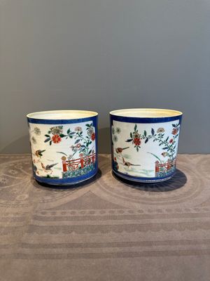 A pair of Chinese powder blue-ground famille verte vessels with a bird in a garden, Kangxi — photo 3