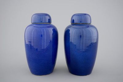 A pair of Chinese powder blue jars with covers, early 19th C.