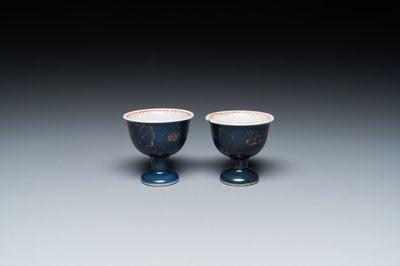 A pair of Chinese powder-blue stem cups with gilt decoration, Kangxi
