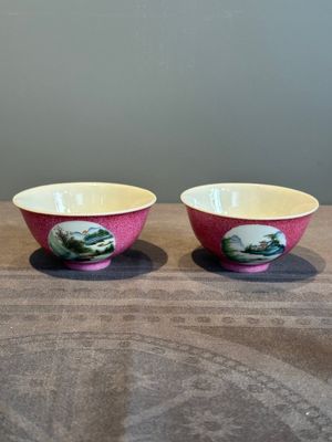 A pair of Chinese puce-sgraffito-ground 'landscape' bowls, Qianlong mark, Republic — photo 1