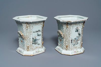 A pair of Chinese qianjiang cai relief-decorated jardinières, 19/20th C.