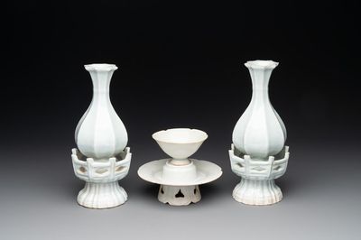 A pair of Chinese qingbai vases and a cup on a stand, 20th C.