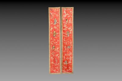 A pair of Chinese red-ground embroidered silk 'Eight Immortals' panels, 19th C.