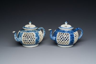 A pair of Chinese reticulated and double-walled blue and white teapots, Transitional period