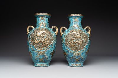 A pair of Chinese robin's egg and faux bronze-glazed 'hu' vases, Qianlong mark, 19th C.