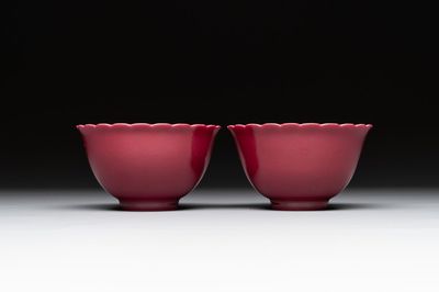 A pair of Chinese ruby-glazed bowls, Qianlong mark, 19/20th C.