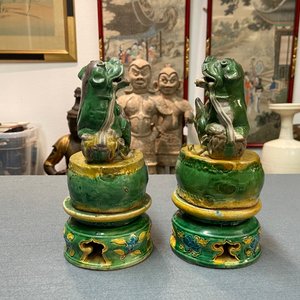 A pair of Chinese sancai-glazed biscuit Buddhist lion joss stick holders, Ming — photo 11