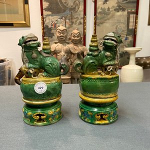 A pair of Chinese sancai-glazed biscuit Buddhist lion joss stick holders, Ming — photo 12