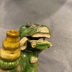 A pair of Chinese sancai-glazed biscuit Buddhist lion joss stick holders, Ming — photo 13