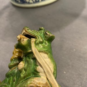 A pair of Chinese sancai-glazed biscuit Buddhist lion joss stick holders, Ming — photo 14