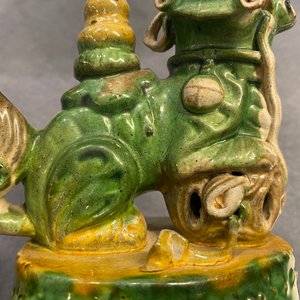A pair of Chinese sancai-glazed biscuit Buddhist lion joss stick holders, Ming — photo 15