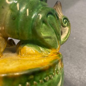 A pair of Chinese sancai-glazed biscuit Buddhist lion joss stick holders, Ming — photo 19
