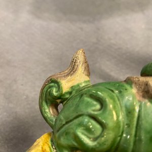 A pair of Chinese sancai-glazed biscuit Buddhist lion joss stick holders, Ming — photo 30