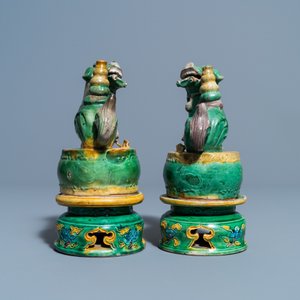 A pair of Chinese sancai-glazed biscuit Buddhist lion joss stick holders, Ming — photo 5