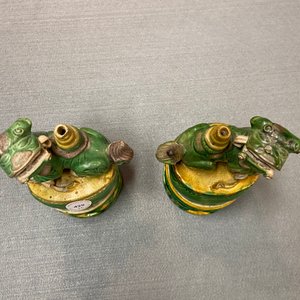 A pair of Chinese sancai-glazed biscuit Buddhist lion joss stick holders, Ming — photo 9