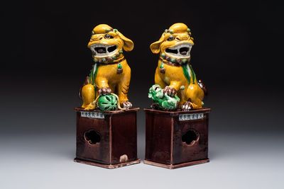 A pair of Chinese sancai-glazed Buddhist lions, Kangxi mark, 19th C.