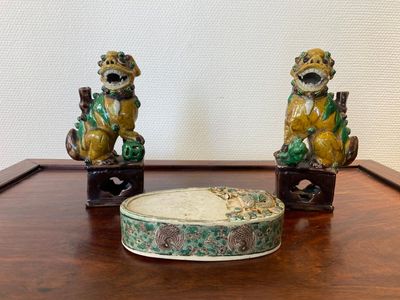 A pair of Chinese sancai incense stick holders and a verte biscuit inkstone, Kangxi or later — photo 1